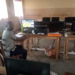 Students working on computers inside the modern ICT laboratory at Ejome Secondary School.